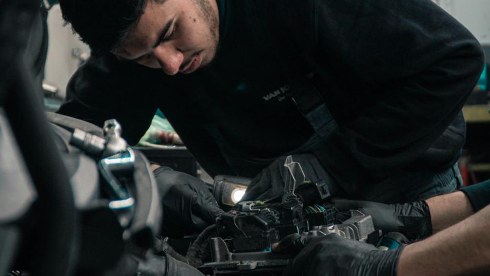 mechanic repairing car