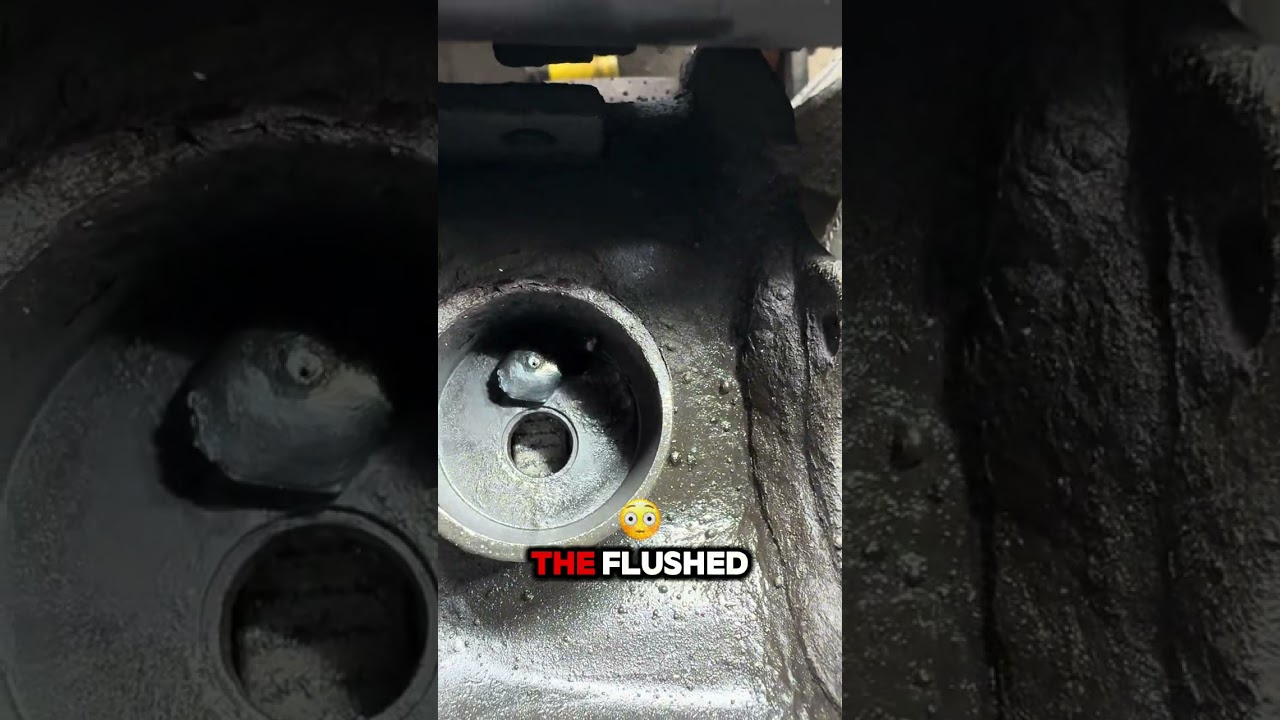 A technician uses a welder to remove a seized ABS sensor screw that has snapped flush with the wheel hub of a Volvo.