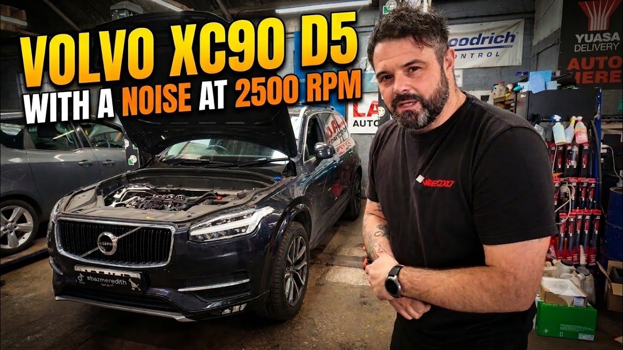 Technician Baz Meredith diagnoses a Volvo XC90 engine rattle, pointing to the faulty crankshaft pulley damper in the engine