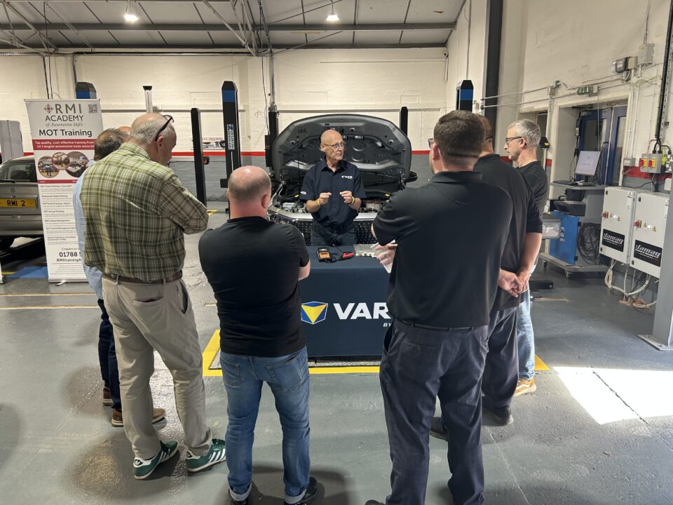 Technicians attend a practical demonstration at the IGA Insider Live event in the RMI Academy workshop.
